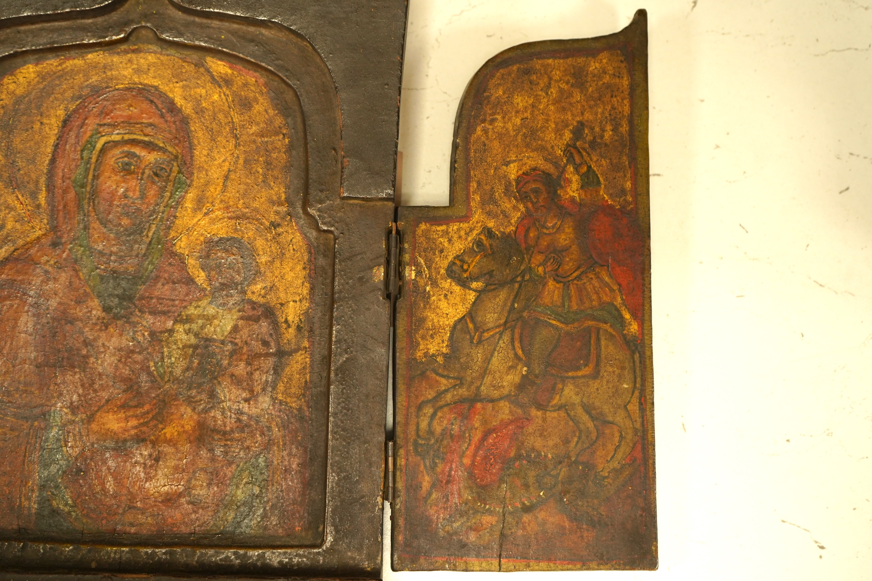 A painted wood triptych icon, 26cm high